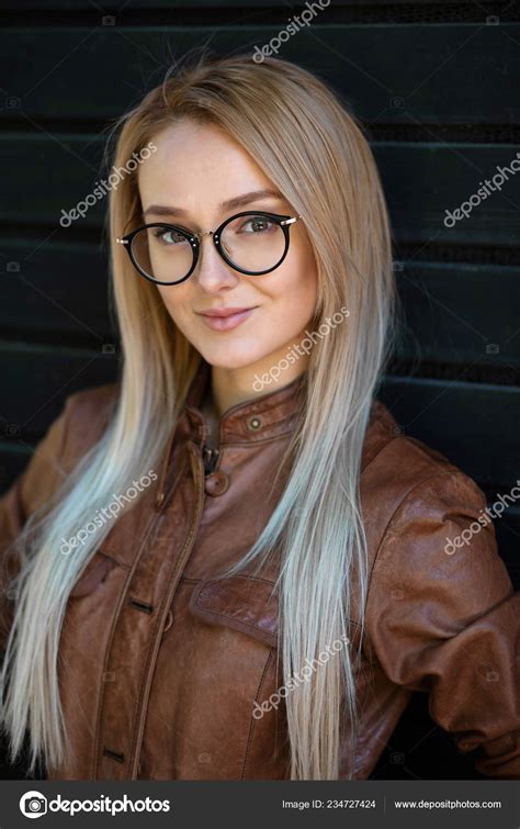 blonde hair girl with glasses|Beautiful Blonde Woman Wearing Glasses Stock。